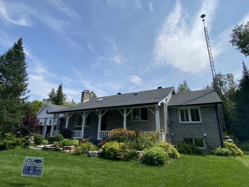 A large house with a lot of green grass