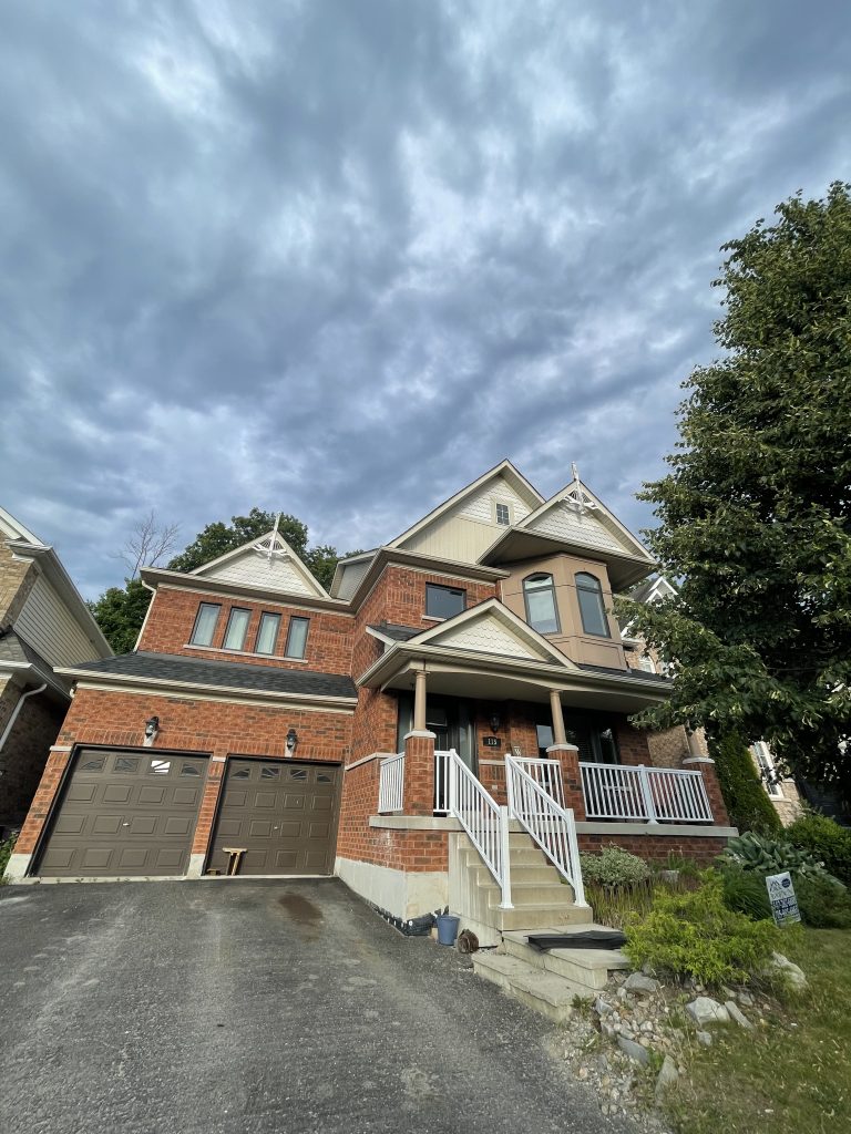 A large house with a sky background